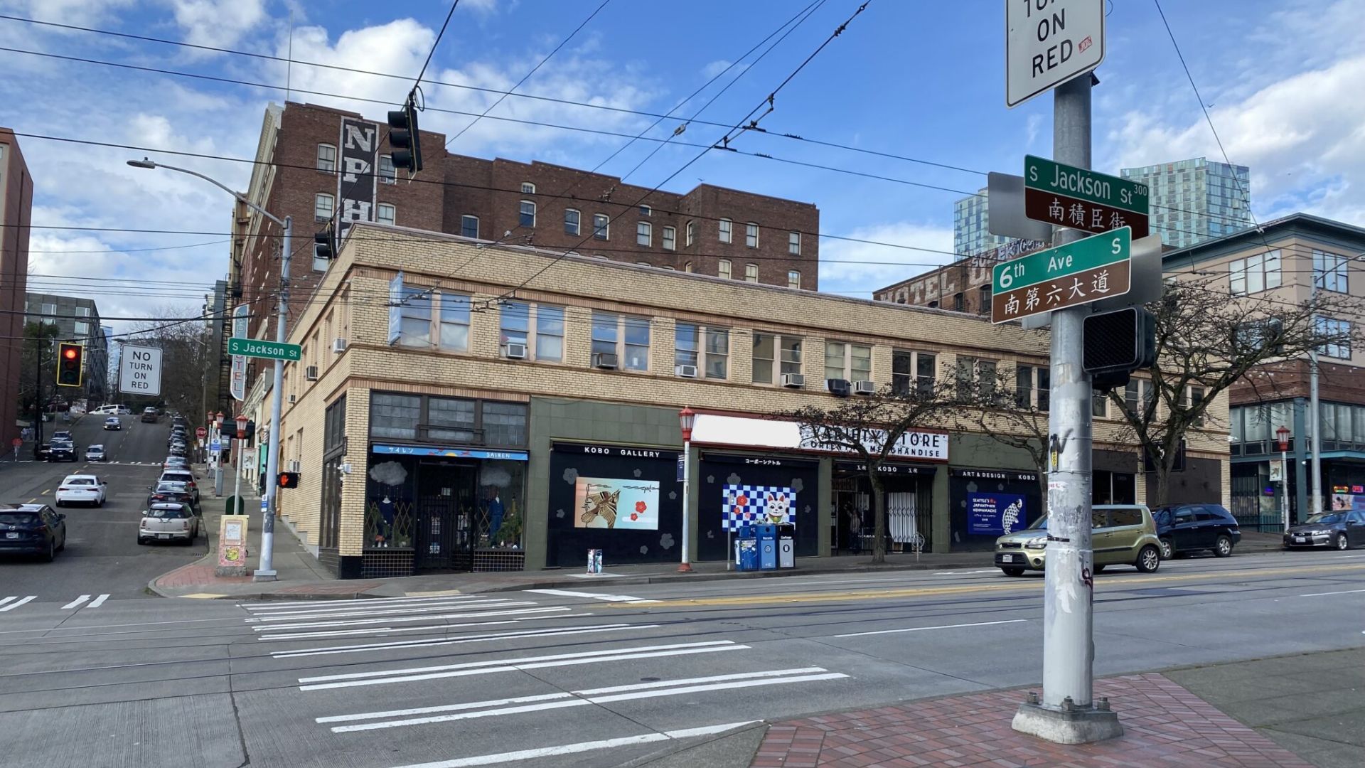 A burst of gunfire shattered the afternoon calm Tuesday in Seattle’s Chinatown-International District, leaving two young men badly hurt and sending detectives searching for answers.